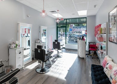 Bright interior of Babe Brows Lash Lounge By Liz, Massapequa Park, New York, US featuring stylish salon chairs.