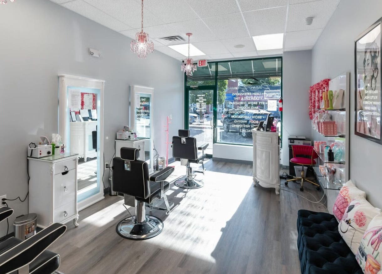 Bright interior of Babe Brows Lash Lounge By Liz, Massapequa Park, New York, US featuring stylish salon chairs.