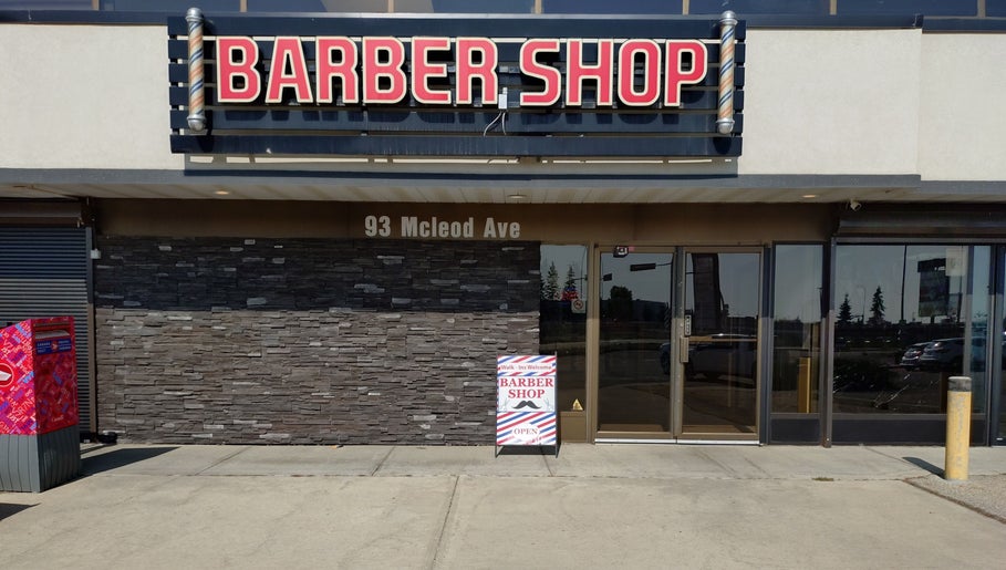 Entrance of A&I Massage Solution at Spruce Grove, Alberta, CA featuring modern brick wall and signage.