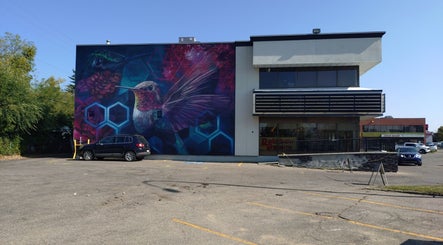 Colorful mural on building front of A&I Massage Solution, Spruce Grove, Alberta, CA.