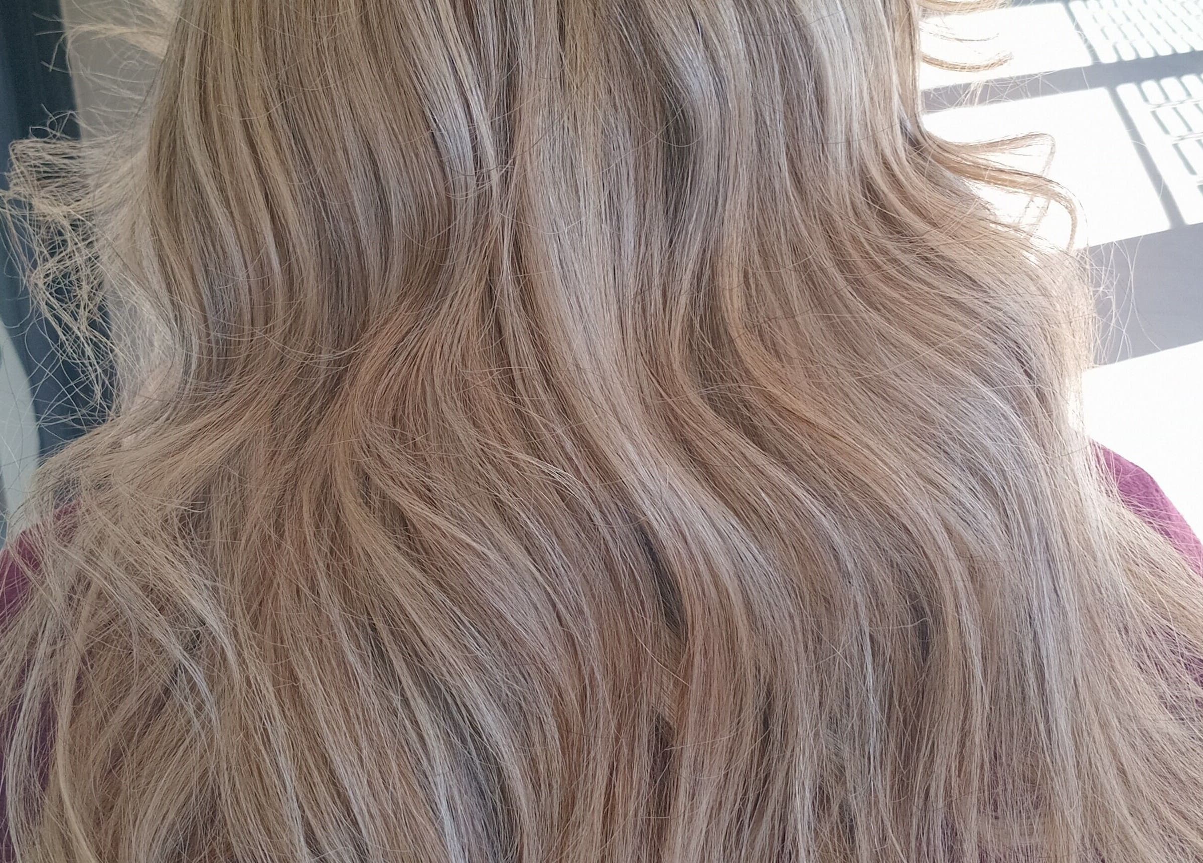 Blonde wavy hairstyle from ELEVATION HAIR 93 BY JULZ, Midrand, Gauteng, ZA.