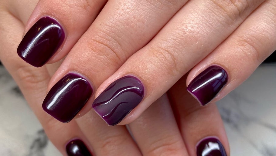 Stylish plum-colored nails with a glossy finish at Nail Oasis, Pukekohe, Auckland, NZ.