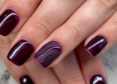 Stylish plum-colored nails with a glossy finish at Nail Oasis, Pukekohe, Auckland, NZ.