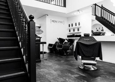 Modern interior of MENSPIRE Old West hair salon in Amsterdam, Noord-Holland, NL with stylish decor.