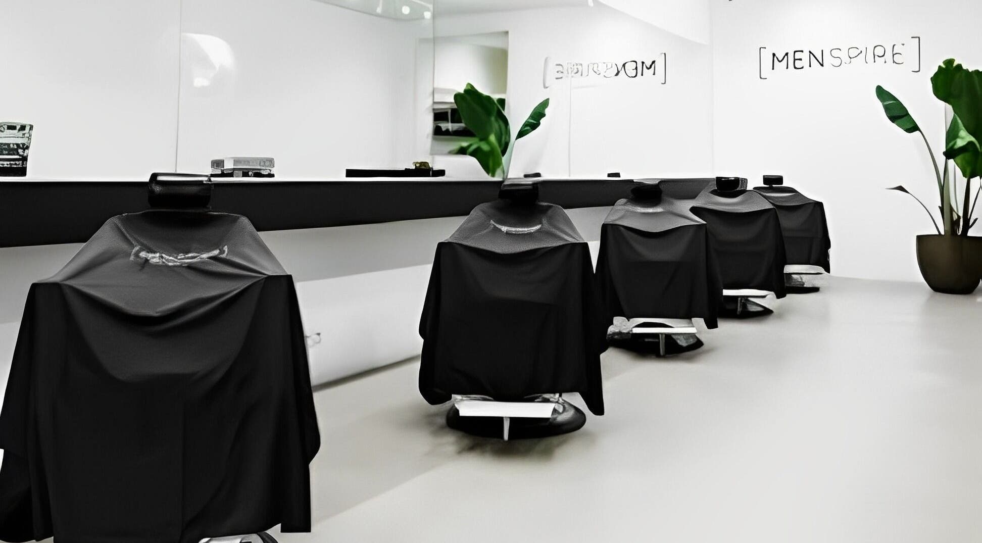 Modern barber chairs at MENSPIRE De Pijp, Amsterdam, Noord-Holland, NL offering stylish grooming services.