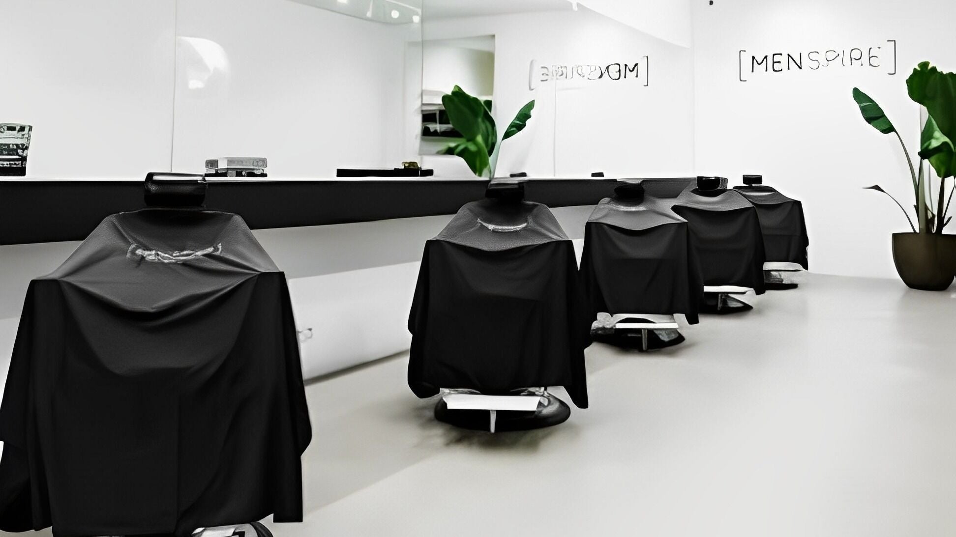 Modern barber chairs at MENSPIRE De Pijp, Amsterdam, Noord-Holland, NL offering stylish grooming services.