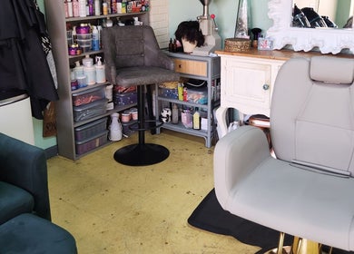Styling chair and beauty products at A Different You Salon, Houston, Texas, US for a welcoming experience.