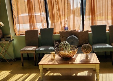 Elegant waiting area in A Different You Salon, Houston, Texas, US with tasteful decor and plush seating.