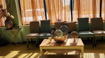 Elegant waiting area in A Different You Salon, Houston, Texas, US with tasteful decor and plush seating.