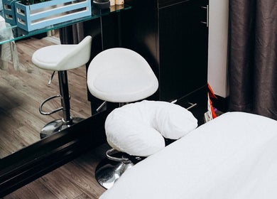 Modern massage room at Natasha & Co Massage in Newton, Massachusetts, US with chic decor and a relaxing ambiance.