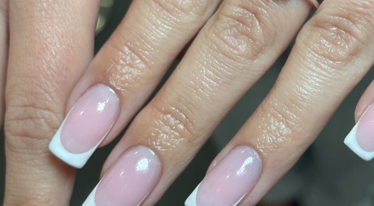 Elegant French manicure at Aura Nail Studio, Fairy Meadow, New South Wales, AU.