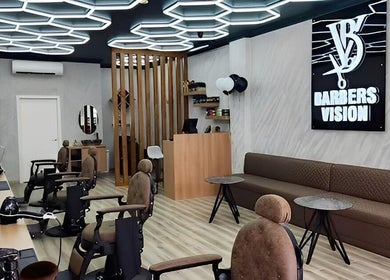 Spacious interior of Barbers Vision in Melbourne, Victoria, AU with modern decor and comfortable seating.