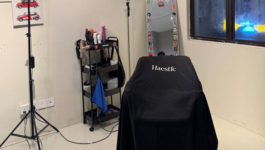 Modern salon corner at HOMECUTZ in Putrajaya, Wilayah Persekutuan Putrajaya, MY with styling tools.