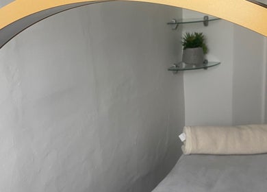 Relaxing spa room at Hude, Royal Tunbridge Wells, England, GB with plush towel and elegant decor.