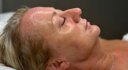 Woman receiving skincare treatment at The Skin Theory, Lichfield, England, GB.