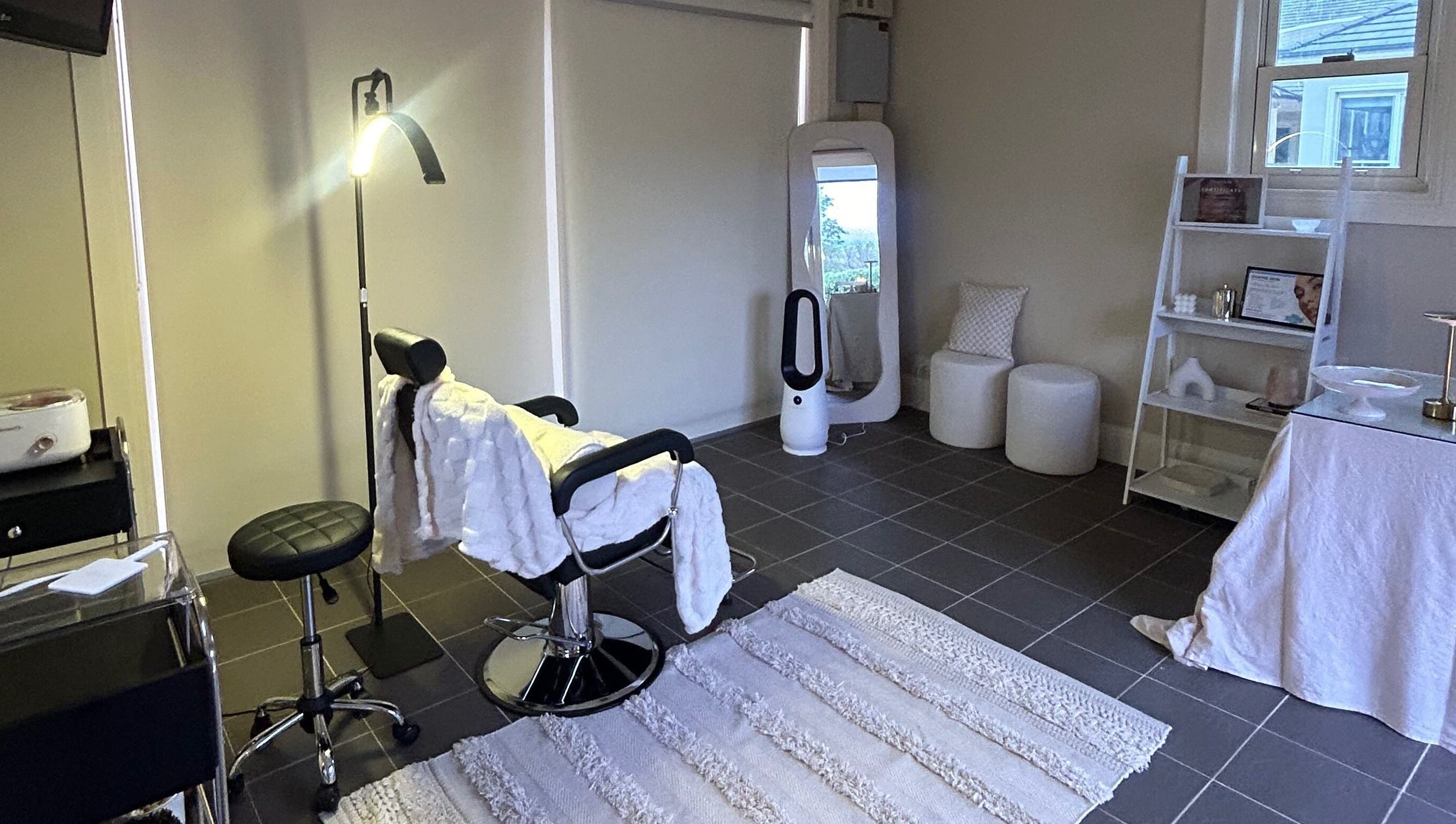 Elegant treatment room at aevum aesthetic in Cobbitty, New South Wales, AU with stylish furnishings.