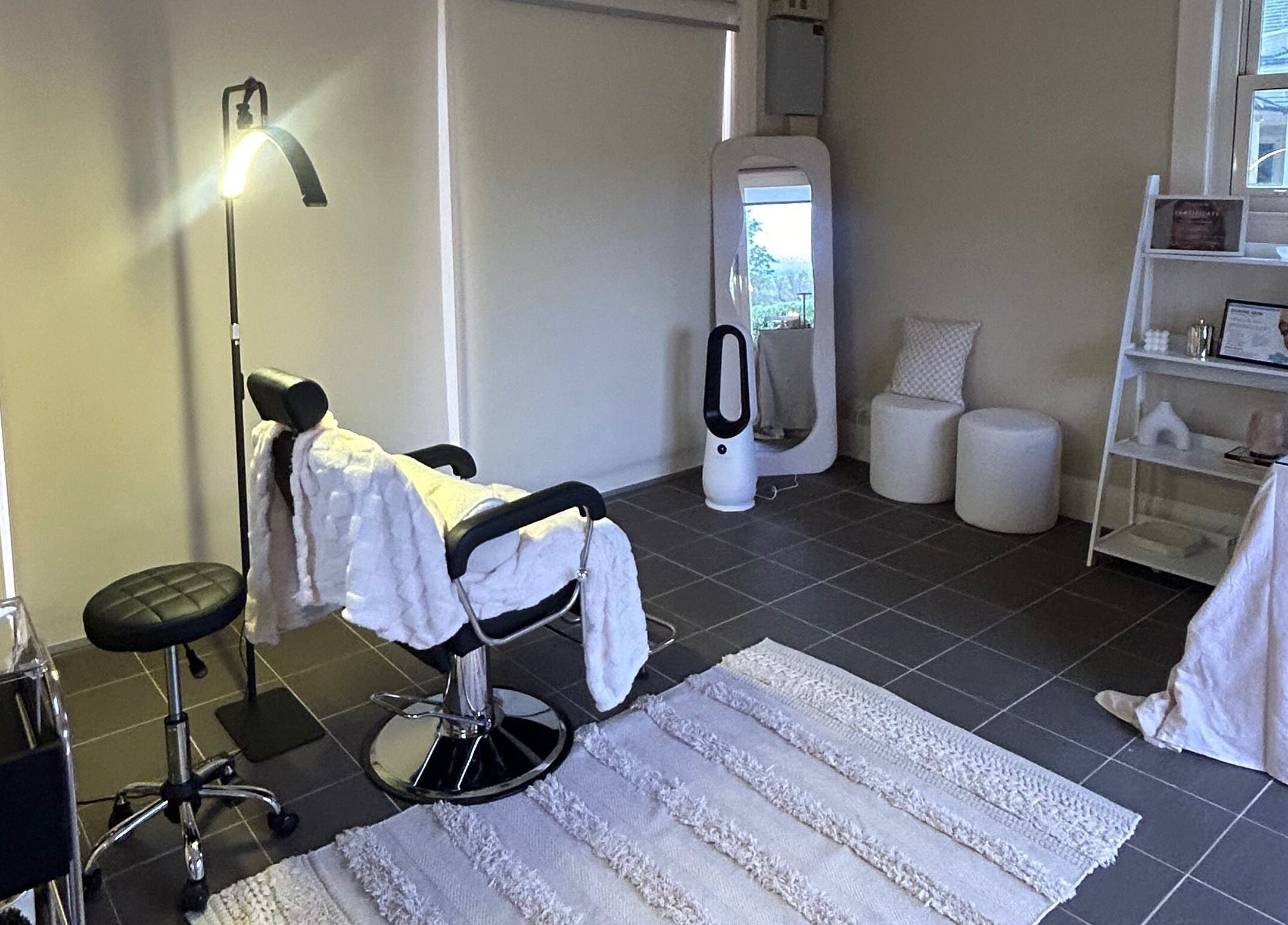 Elegant treatment room at aevum aesthetic in Cobbitty, New South Wales, AU with stylish furnishings.