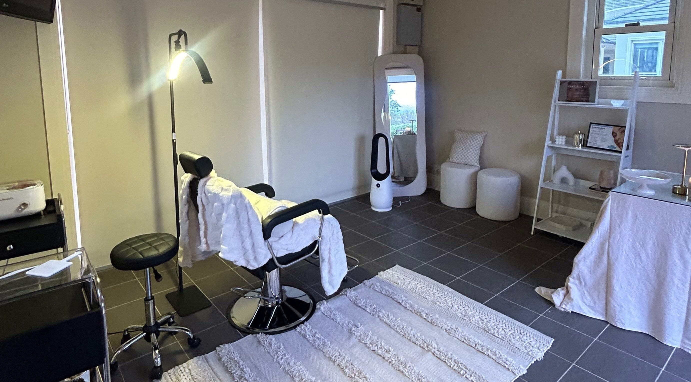 Elegant treatment room at aevum aesthetic in Cobbitty, New South Wales, AU with stylish furnishings.
