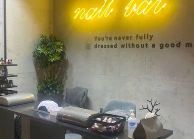 Manicure station at 5ive Seconds Salon - Al Raed, Riyadh, Riyadh Province, SA with nail polish and decor.