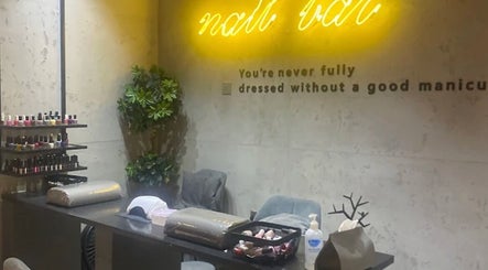 Manicure station at 5ive Seconds Salon - Al Raed, Riyadh, Riyadh Province, SA with nail polish and decor.