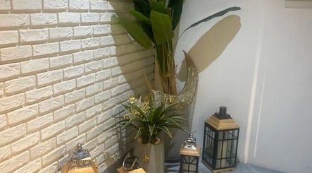Inviting decor with lanterns and plants at 5ive Seconds Salon - Al Raed, Riyadh, Riyadh Province, SA.
