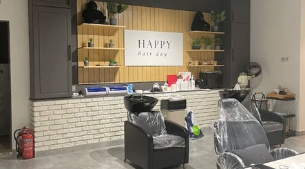 Modern wash station at 5ive Seconds Salon - Al Raed in Riyadh, Riyadh Province, SA. Stylish decor with sleek chairs.