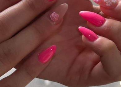 Pink manicured nails with floral design at Five Seconds Salon - King Abdulaziz, Riyadh, Riyadh Province, SA.
