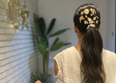 Elegant hairstyle with gold accents at Five Seconds Salon - King Abdulaziz, Riyadh, Riyadh Province, SA.