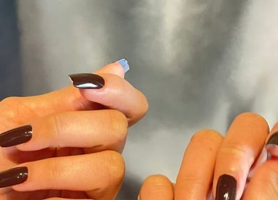 Chic dark manicure at Five Seconds Salon - King Abdulaziz, Riyadh, Riyadh Province, SA.