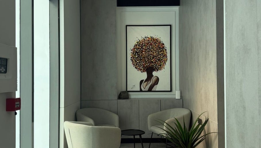 Relaxing lounge with art at Five Seconds Salon - King Abdulaziz, Riyadh, Riyadh Province, SA.