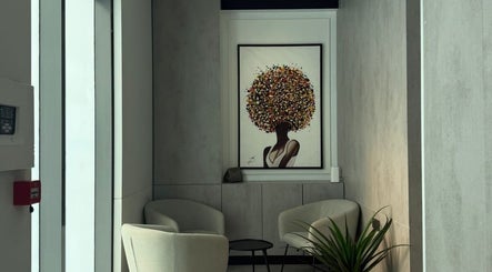 Relaxing lounge with art at Five Seconds Salon - King Abdulaziz, Riyadh, Riyadh Province, SA.