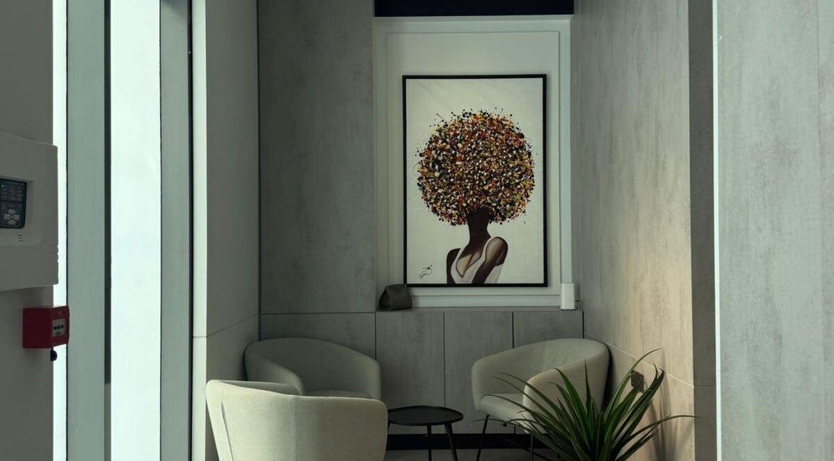 Relaxing lounge with art at Five Seconds Salon - King Abdulaziz, Riyadh, Riyadh Province, SA.