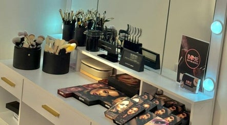 Makeup station with brushes and palettes at Evelina's Lashes in London, England, GB.
