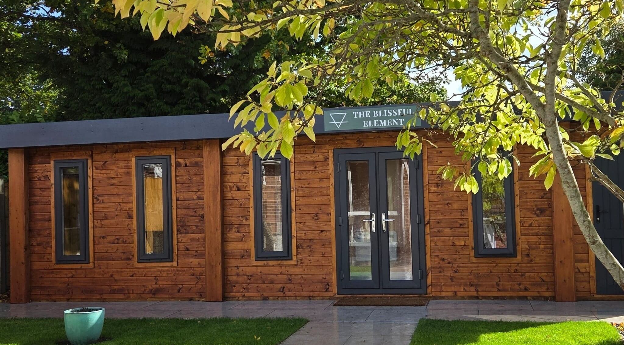 Entrance to The Blissful Element, a serene wooden cabin in Chandler's Ford, England, GB.