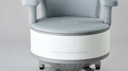 Modern grey spa chair at Core Waves, Royal Leamington Spa, England, GB, enhancing relaxation and wellness.