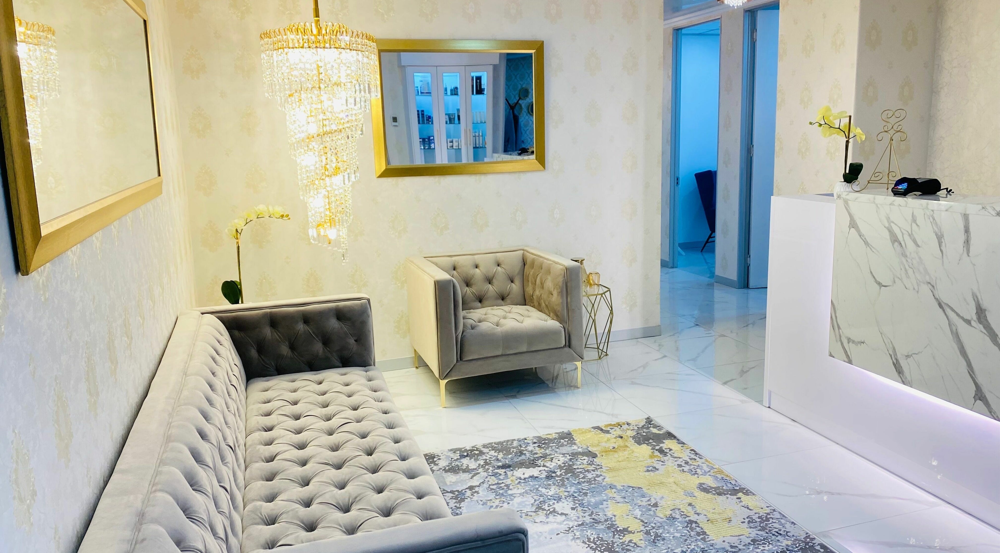 Luxurious waiting area in Skin and Slimming Aesthetic Clinic, Sandton, Gauteng, ZA with chic décor and plush seating.