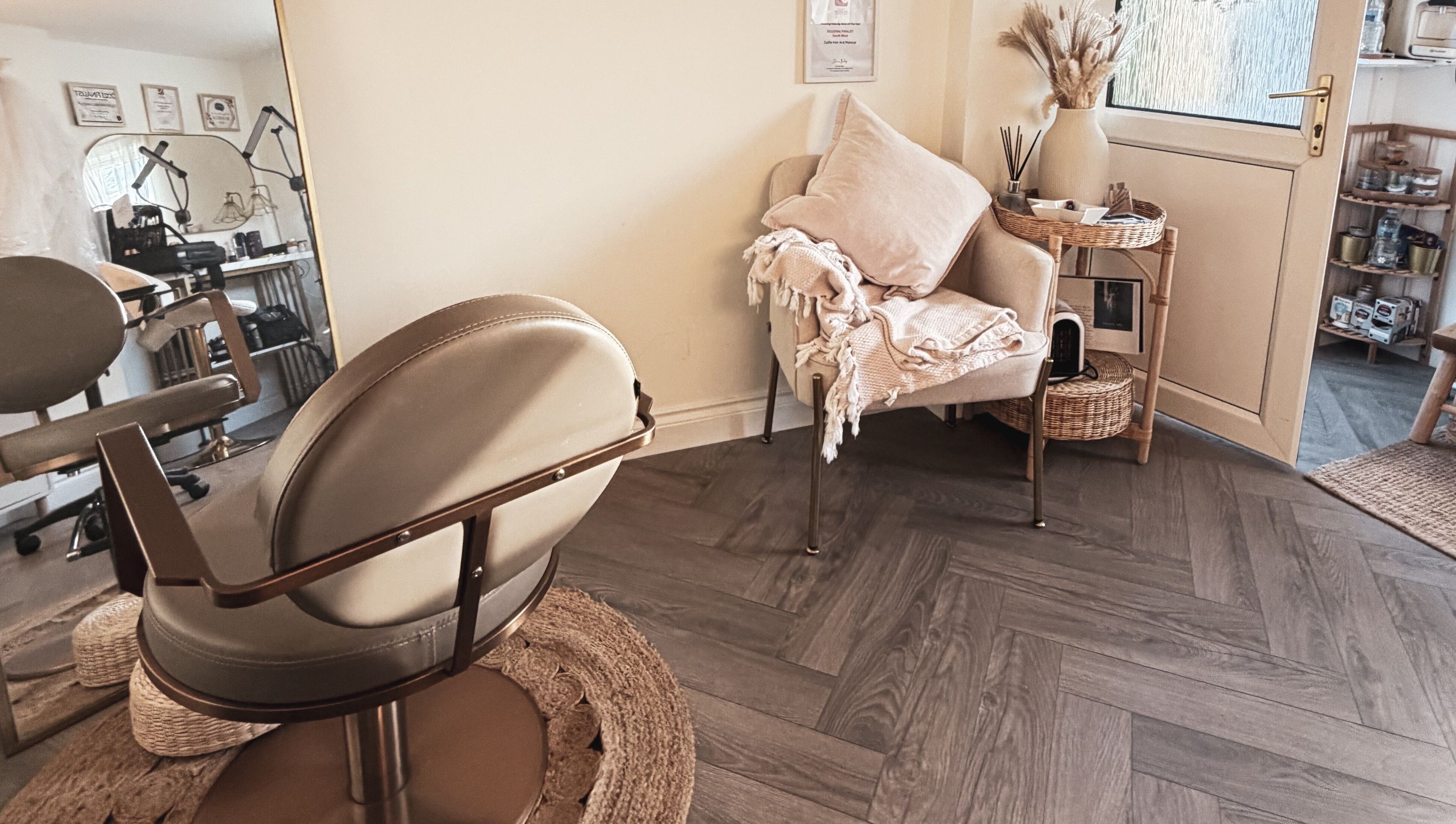 Elegant seating area with salon chair at Celfie Bridal Hair and Makeup, Midsomer Norton, England, GB.