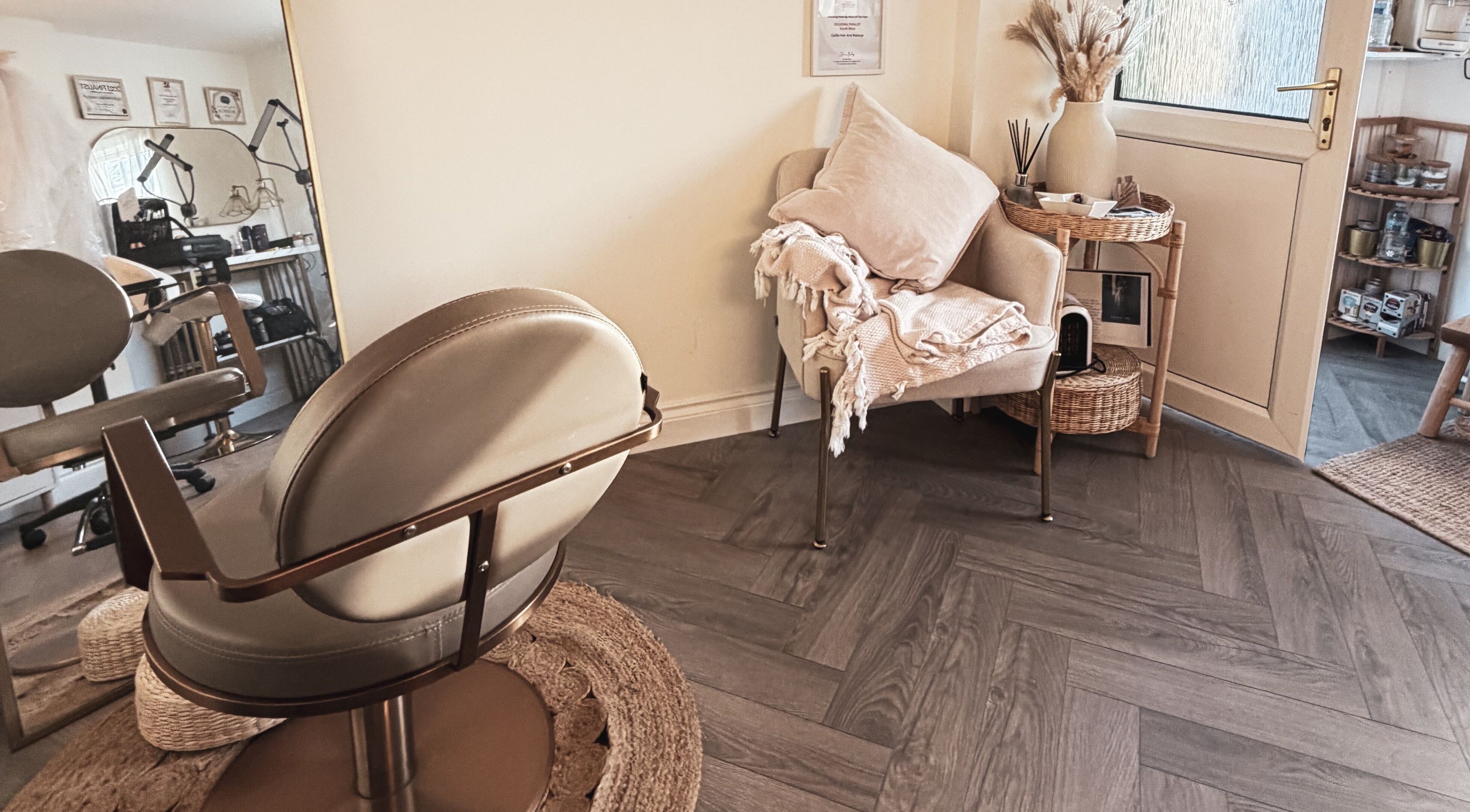 Elegant seating area with salon chair at Celfie Bridal Hair and Makeup, Midsomer Norton, England, GB.
