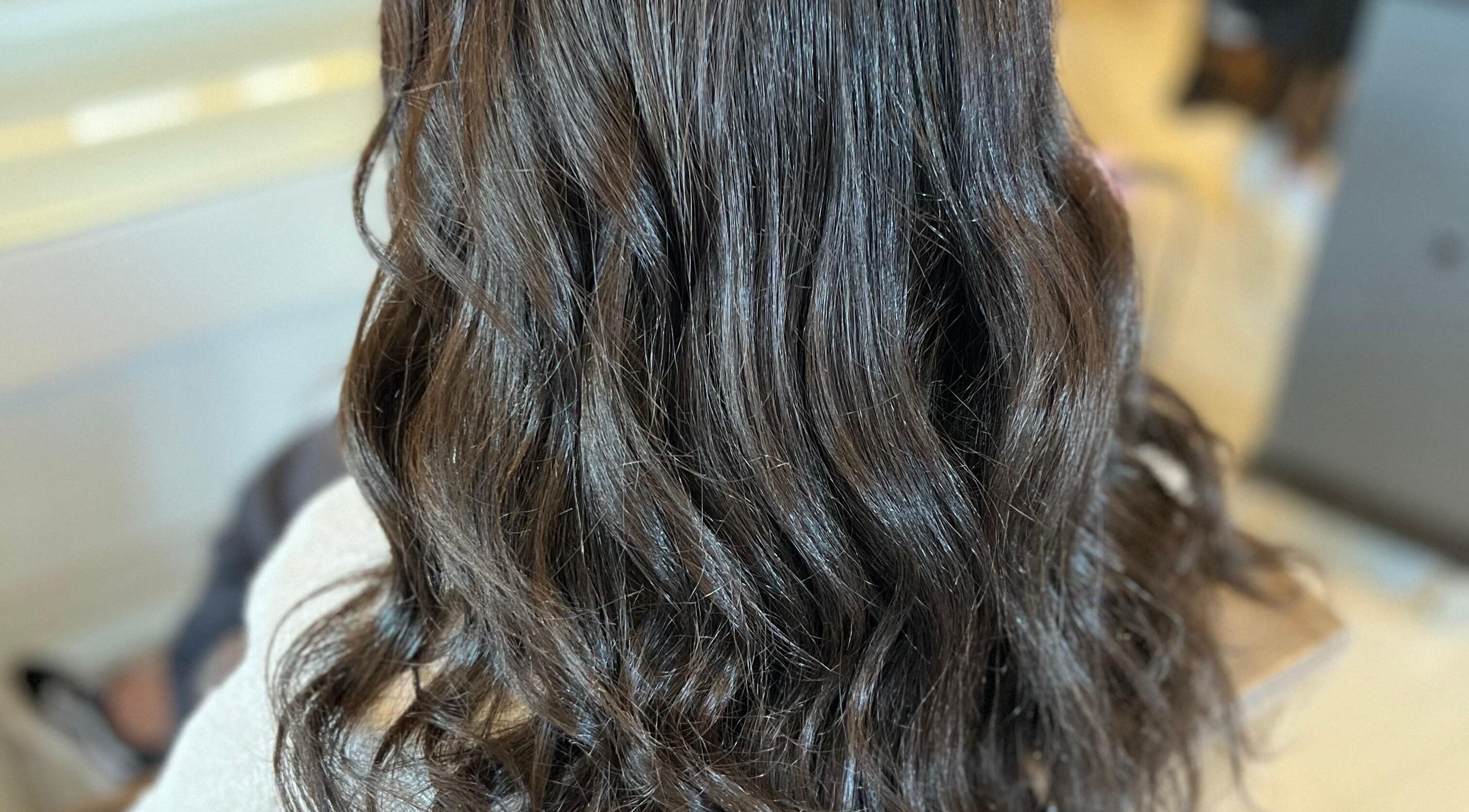 Elegant wavy brunette hairstyle at Hair by Abby, Worcester, Western Cape, ZA.