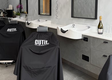 Luxury salon chairs and washbasins at CUTit, Beckenham, England, GB ready for clients.
