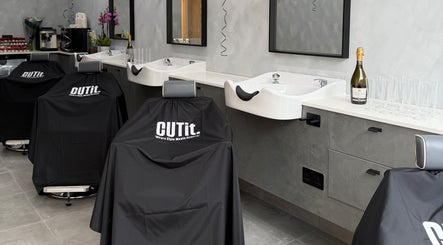Luxury salon chairs and washbasins at CUTit, Beckenham, England, GB ready for clients.
