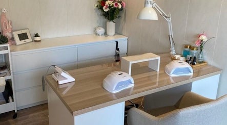 Modern nail station at Nailed.By.Penny in Boksburg, Gauteng, ZA, featuring stylish decor and manicure tools.