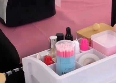 Beauty tools setup at Lash&Brow Glow in Toronto, Ontario, CA featuring pink accessories.