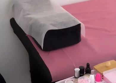 Lash&Brow Glow beauty room in Toronto, Ontario, CA with a cozy treatment bed and organized tools.