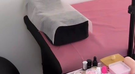 Lash&Brow Glow beauty room in Toronto, Ontario, CA with a cozy treatment bed and organized tools.