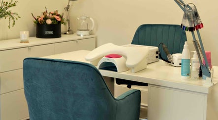 Cozy nail station at Kateryna Nails, Birmingham, England, GB, featuring plush seating and modern nail care tools.
