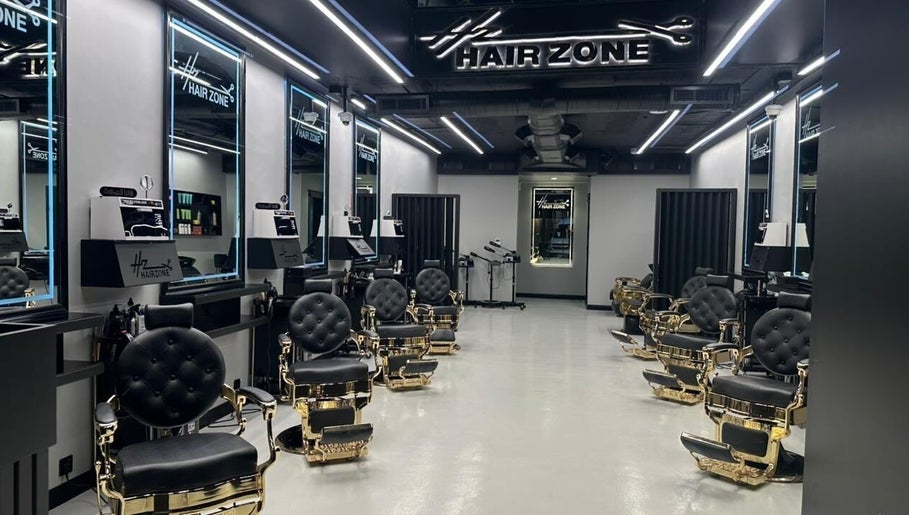 Luxury salon interior at Hair Zone - An Narjis, featuring plush seating in Riyadh, Riyadh Province, SA.
