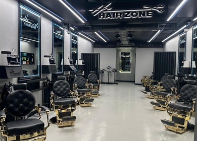 Luxury salon interior at Hair Zone - An Narjis, featuring plush seating in Riyadh, Riyadh Province, SA.