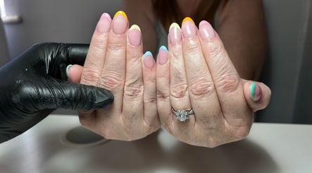 Colorful nail art at T tips and toes, St Albans, England, GB, showcasing a vibrant manicure.