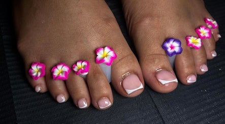 Floral-themed pedicure at T Tips And Toes, St Albans, England, GB showcasing nail art elegance.